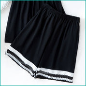 Black Cami and Shorts Set with Delicate Bow Detail and Lace-Trimmed Hem